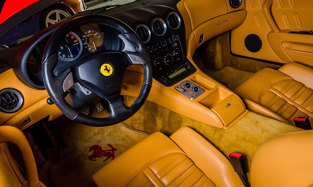 The interior of a Ferrari being serviced by F Imports & Exotics | Exotics and Luxury Car Service Center & Repairs Southwest Florida